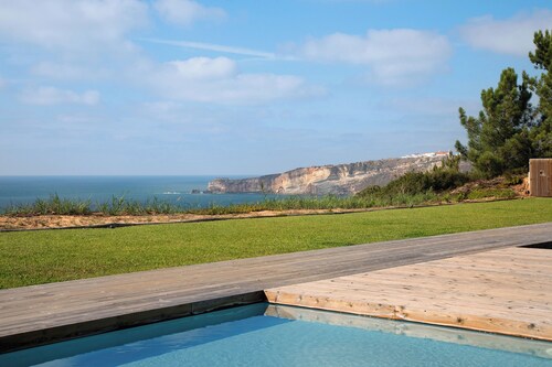 Appartement "Luxury Boho Style Nazaré" avec vue sur la mer, piscine partagée et Wi-Fi.