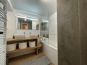 Bathtub, hair dryer
