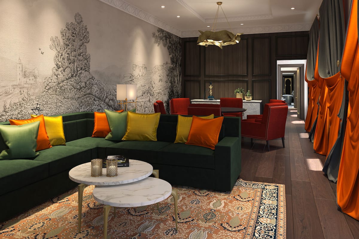 Un salon moderne avec un canapé vert, des coussins colorés, une table basse en marbre et une grande fresque murale.