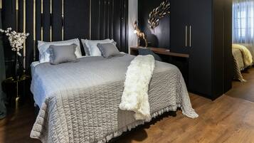 Premium bedding, memory foam beds, desk, laptop workspace