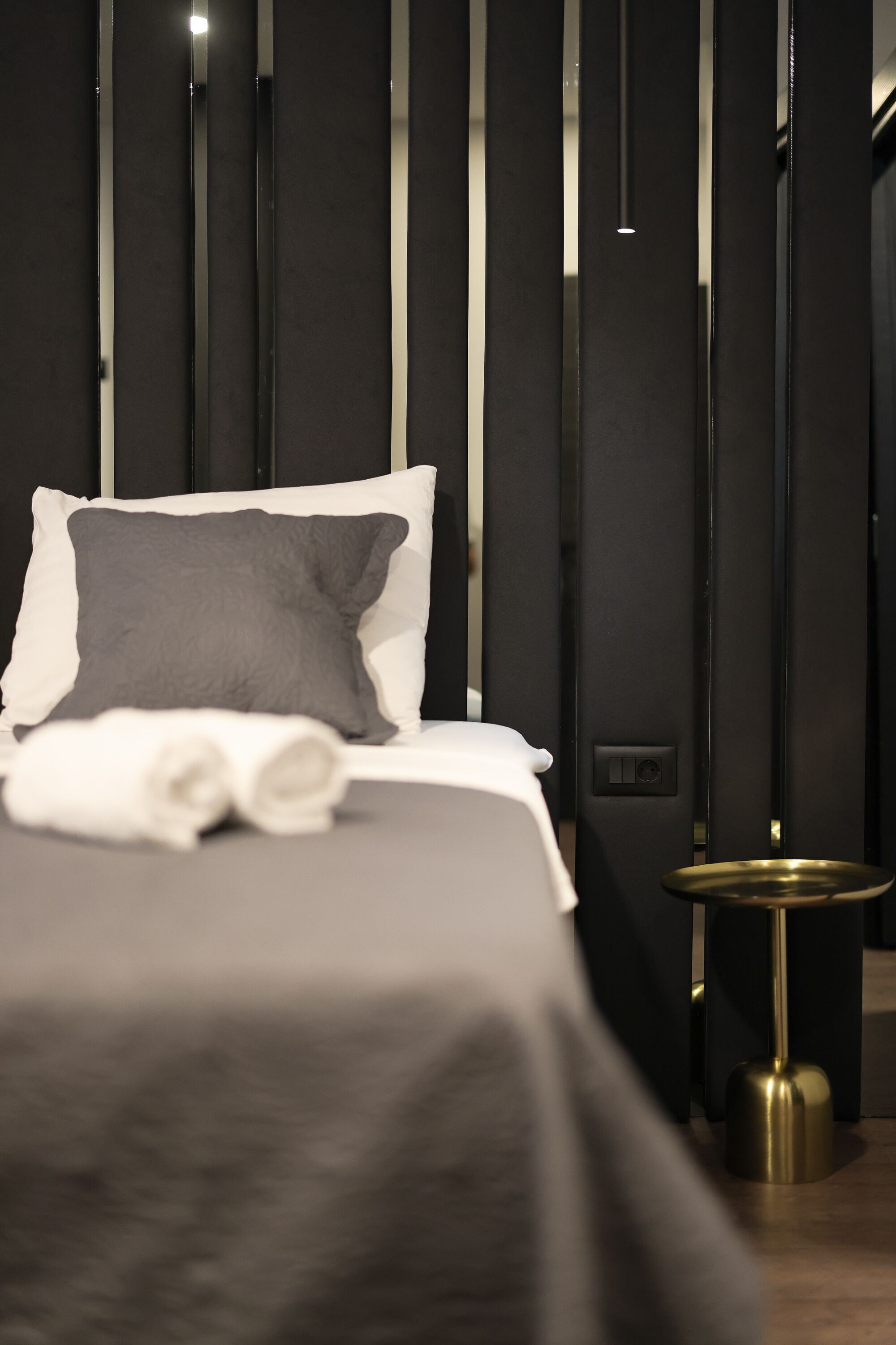 Premium bedding, memory-foam beds, desk, laptop workspace