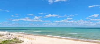 Beachfront home with expansive deck, screened porch, washer/dryer & central AC