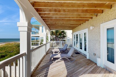 Beachfront home with a pool, game room, deck, grill, washer/dryer & central AC