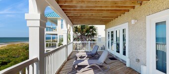Beachfront home with a pool, game room, deck, grill, washer/dryer & central AC