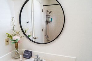 Combined shower/tub, hair dryer, soap, toilet paper - The Hillview Hangout (Grand Junction)