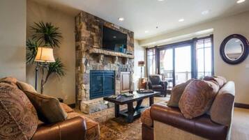 Condo | Living area | 40-inch flat-screen TV with digital channels, TV, fireplace