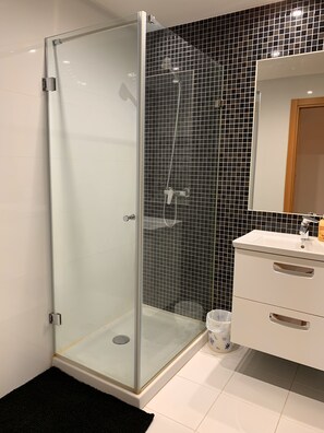 Shower, jetted tub, hair dryer, slippers