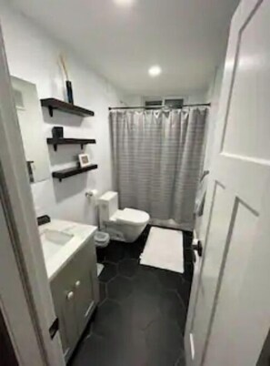 Combined shower/bathtub