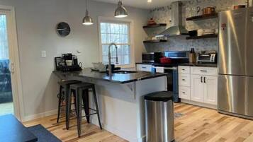 Microwave, dishwasher, blender, cookware/dishes/utensils