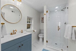 Shower, hair dryer, towels, soap