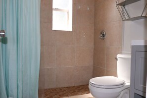 Bathtub, hair dryer, towels