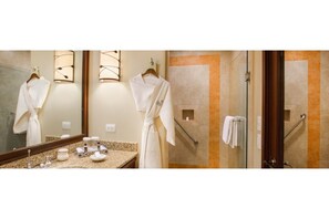 Regadera, secadora de cabello, toallas, jabón 