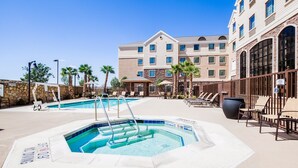 A hotel pool area with two swimming pools, lounge chairs, and a hot tub. - 2 Bedrooms | Free Daily Breakfast, Outdoor Pool (El Paso)