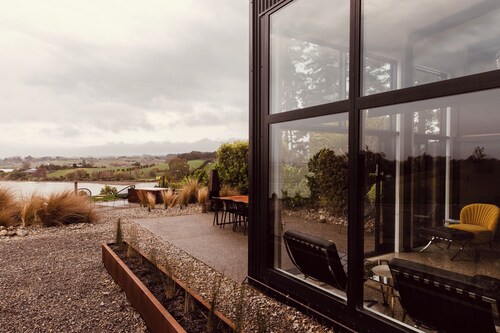 Coastal Calm | Luxe Stay with Views, Bath & Fire.