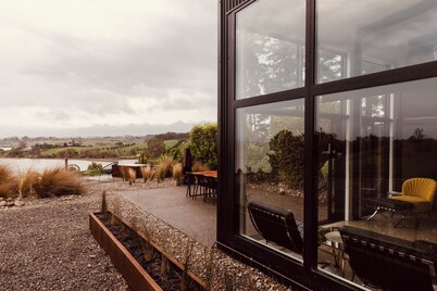 Coastal Calm | Luxe Stay with Views, Bath & Fire.