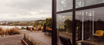 Coastal Calm | Luxe Stay with Views, Bath & Fire.