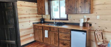 Fridge, microwave, stovetop, coffee/tea maker