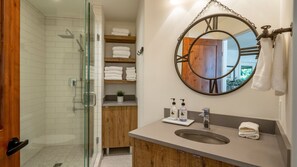 Shower, hair dryer, towels