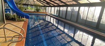 Charming Log Cabin Retreat with Flower Garden