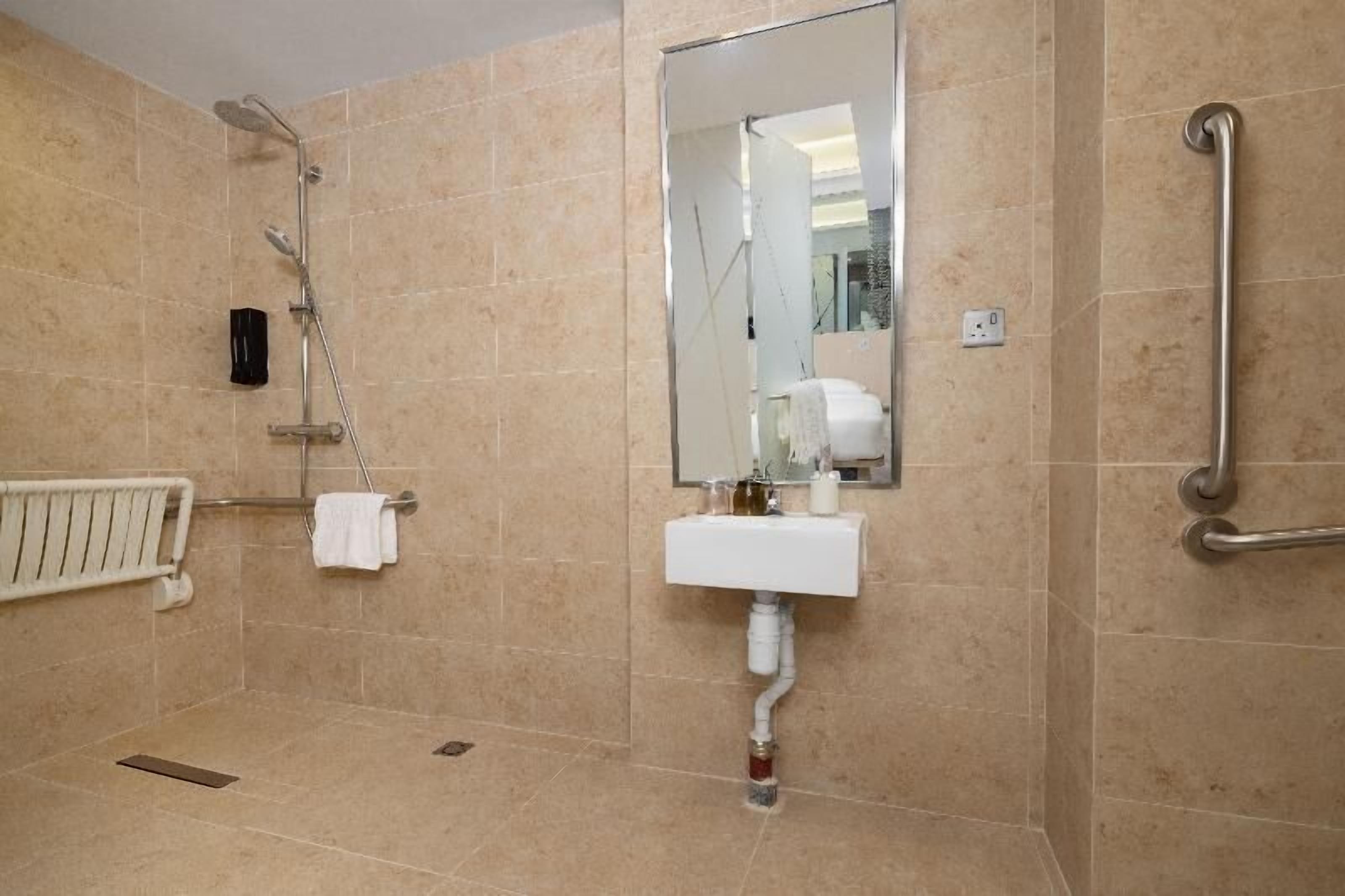 Bathroom | Shower, rainfall showerhead, eco-friendly toiletries, hair dryer