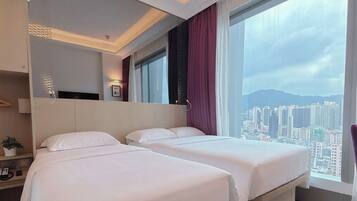 Lion Rock Family Triple Room | Premium bedding, down comforters, minibar, in-room safe