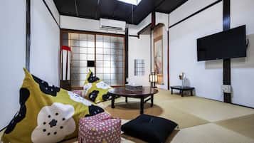 City House | Living area | 55-inch flat-screen TV with digital channels