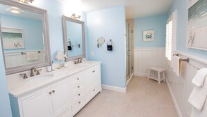 A bathroom with a large vanity, a shower, and a small stool. - OCEANFRONT, 4 BRs, Ocean Views, NP13-2, Summer Wind (Duck)