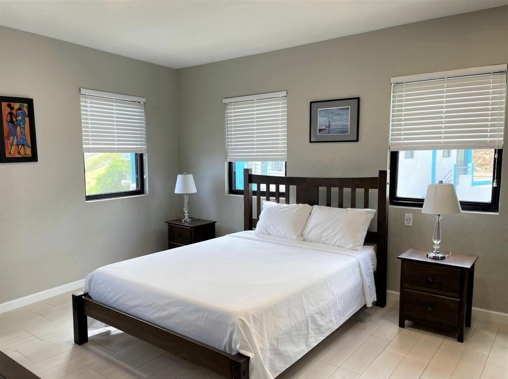 business condo, 1 queen bed | individually decorated, individually furnished, desk, laptop workspace