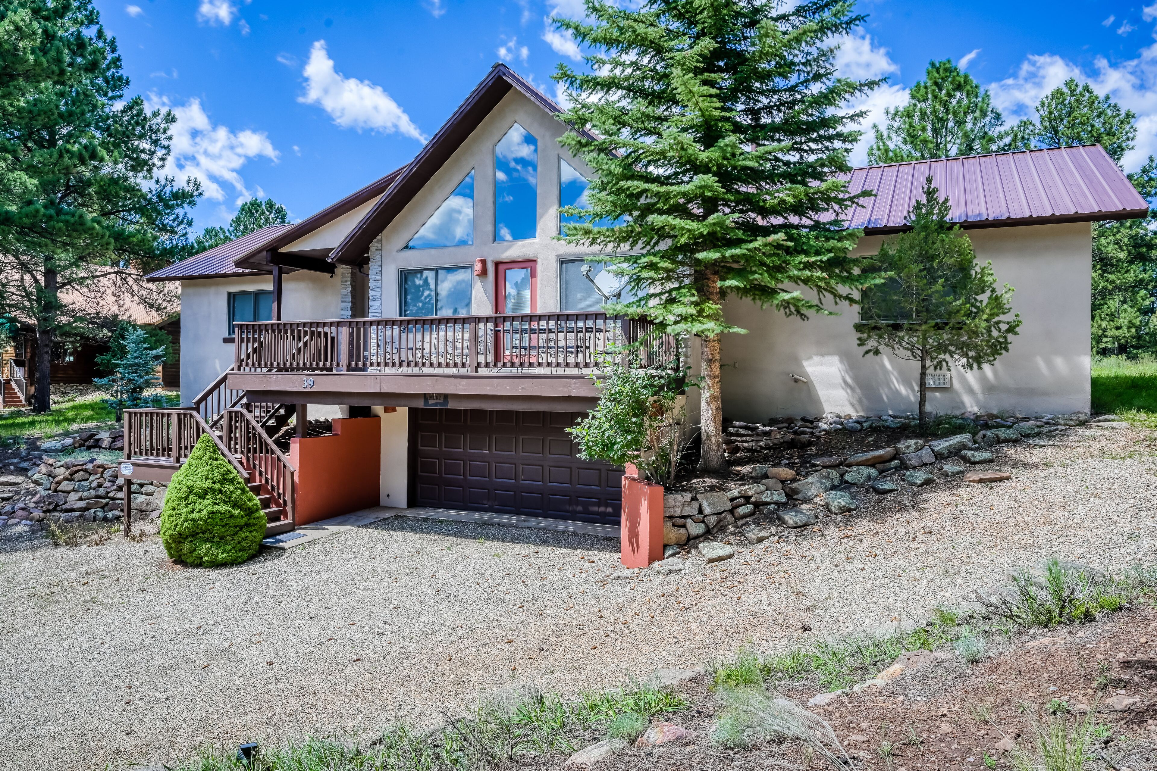 Angel Fire Resort home with large deck, fireplace, washer/dryer, & balcony