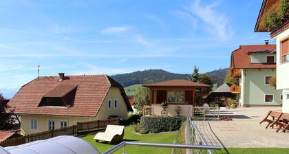 Cosy holiday apartment with large garden and pool