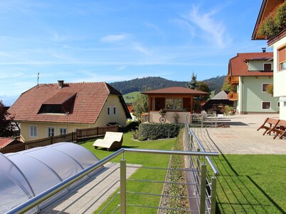 Cosy holiday apartment with large garden and pool