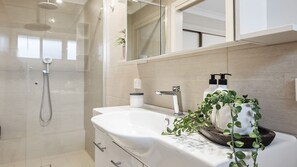Bathtub, hair dryer, towels