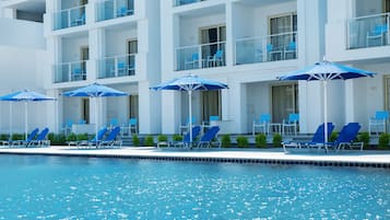 3 outdoor pools, pool umbrellas, sun loungers