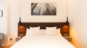 Suite junior con balcón | 1 dormitorio, ropa de cama de alta calidad, edredones de plumas