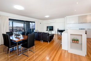Grand Apartment, 2 Bedrooms, Balcony, Harbor View | Living area | 55-inch flat-screen TV with cable channels, TV, DVD player - Fremantle Harbourside  Apartments (Fremantle)