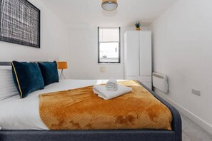 Departamento, 2 camas Queen size | 2 habitaciones, tabla de planchar con plancha y wifi gratis 