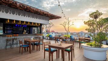 Rooftop bar, poolside views, open daily