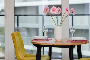 Large table with chairs for eating communal meals.  - Warsaw | Kokoryczki 5 | Functional Studio | Desk (Warszawa)
