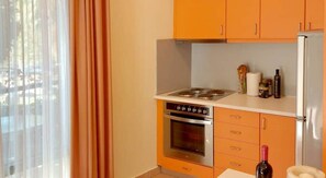 Fridge, oven, electric kettle, toaster