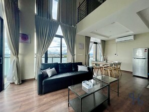Family Penthouse | Living area | 40-inch LED TV with digital channels, TV, Netflix - Homesuite’ Home @ Riverson SOHO (Kota Kinabalu)