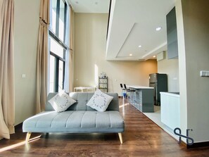 Family Duplex | Living area | 40-inch LED TV with digital channels, TV, Netflix - Homesuite’ Home @ Riverson SOHO (Kota Kinabalu)
