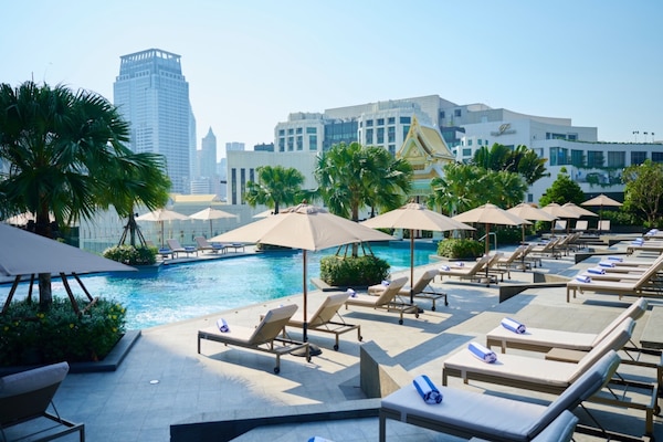 Outdoor pool, open 6:00 AM to 8:00 PM, free pool cabanas, pool umbrellas