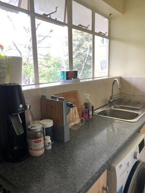 Apartment, 1 Queen Bed | Private kitchen | Fridge, microwave, oven, stovetop