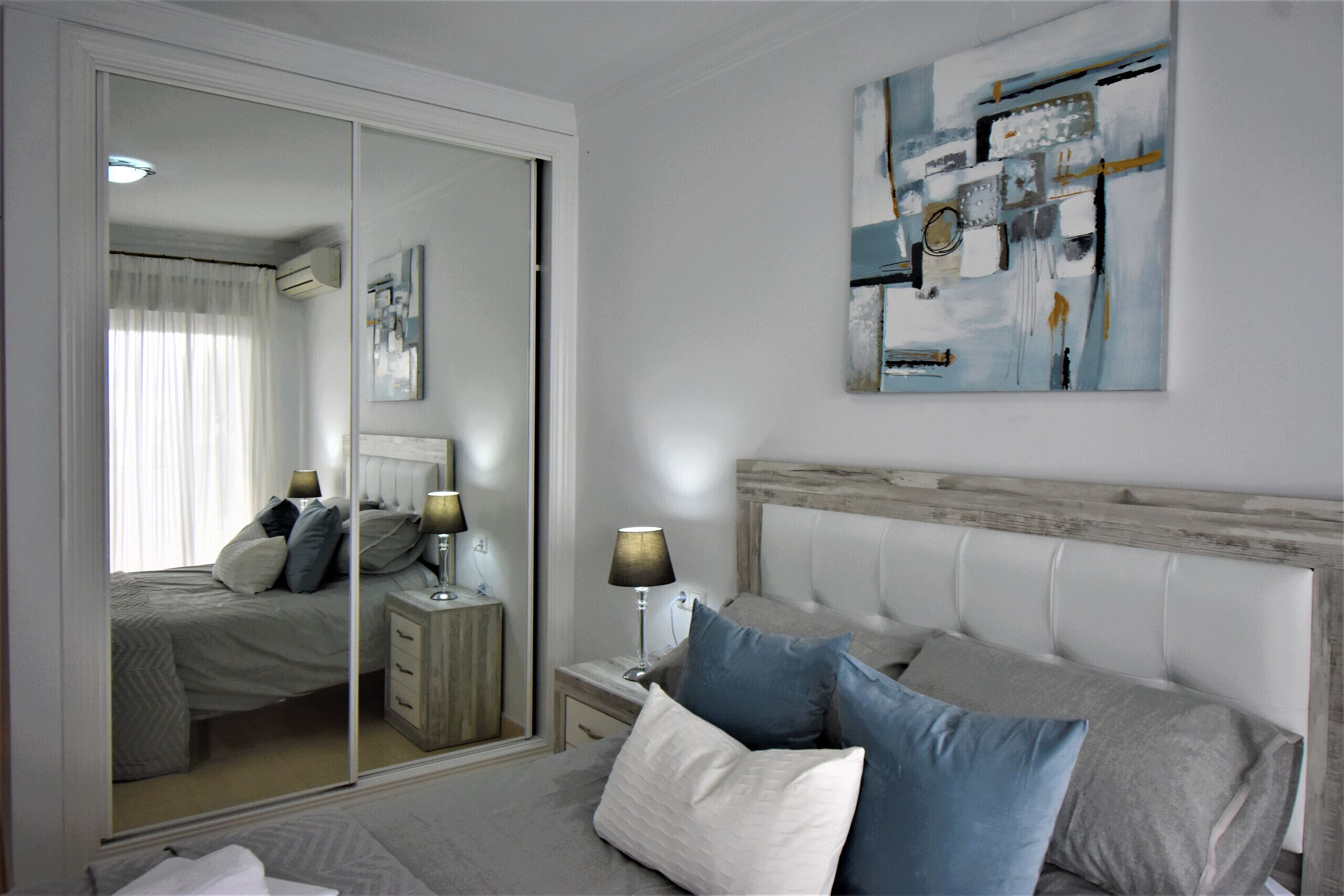 2 dormitorios, tabla de planchar con plancha, wifi gratis y ropa de cama