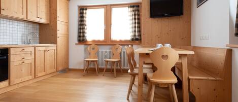 Apartment (2 Bedrooms) | Living area | 55-inch flat-screen TV with cable channels, TV