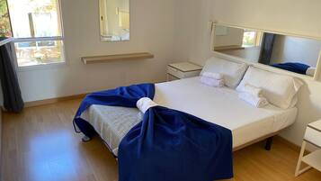Apartment | 1 bedroom, laptop workspace, blackout curtains, iron/ironing board