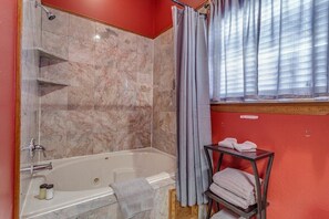 Shower, jetted bath, hair dryer, towels