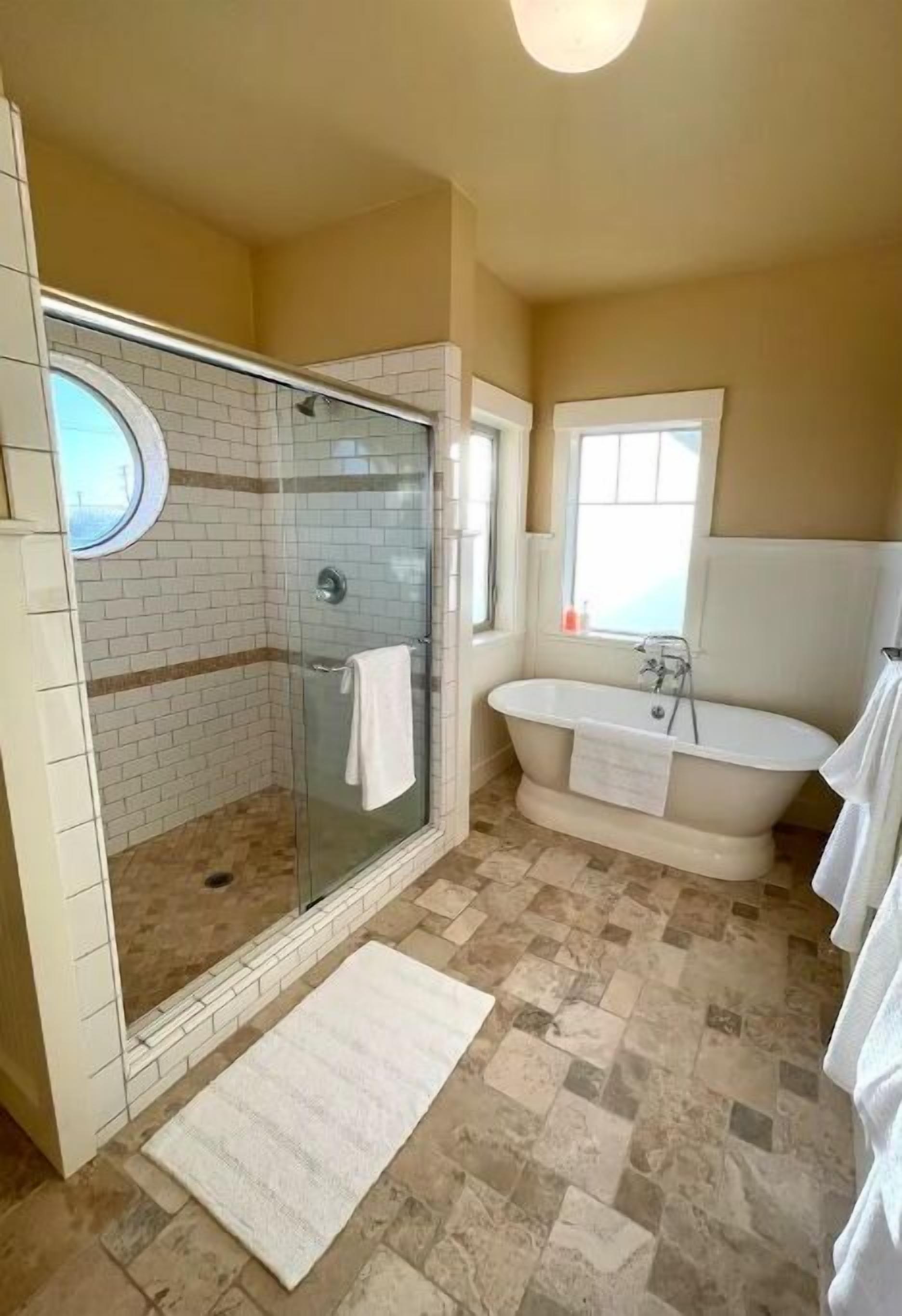 Bathtub, hair dryer, towels, soap