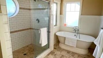 Bathtub, hair dryer, towels, soap