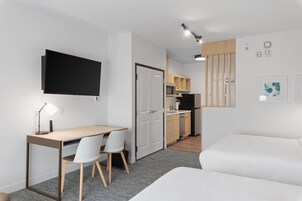 Desk, laptop workspace, free WiFi, bed sheets